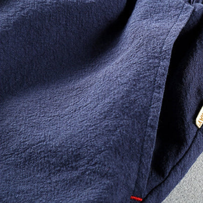 RELAXED LINEN BLEND TROUSERS