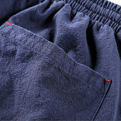 RELAXED LINEN BLEND TROUSERS