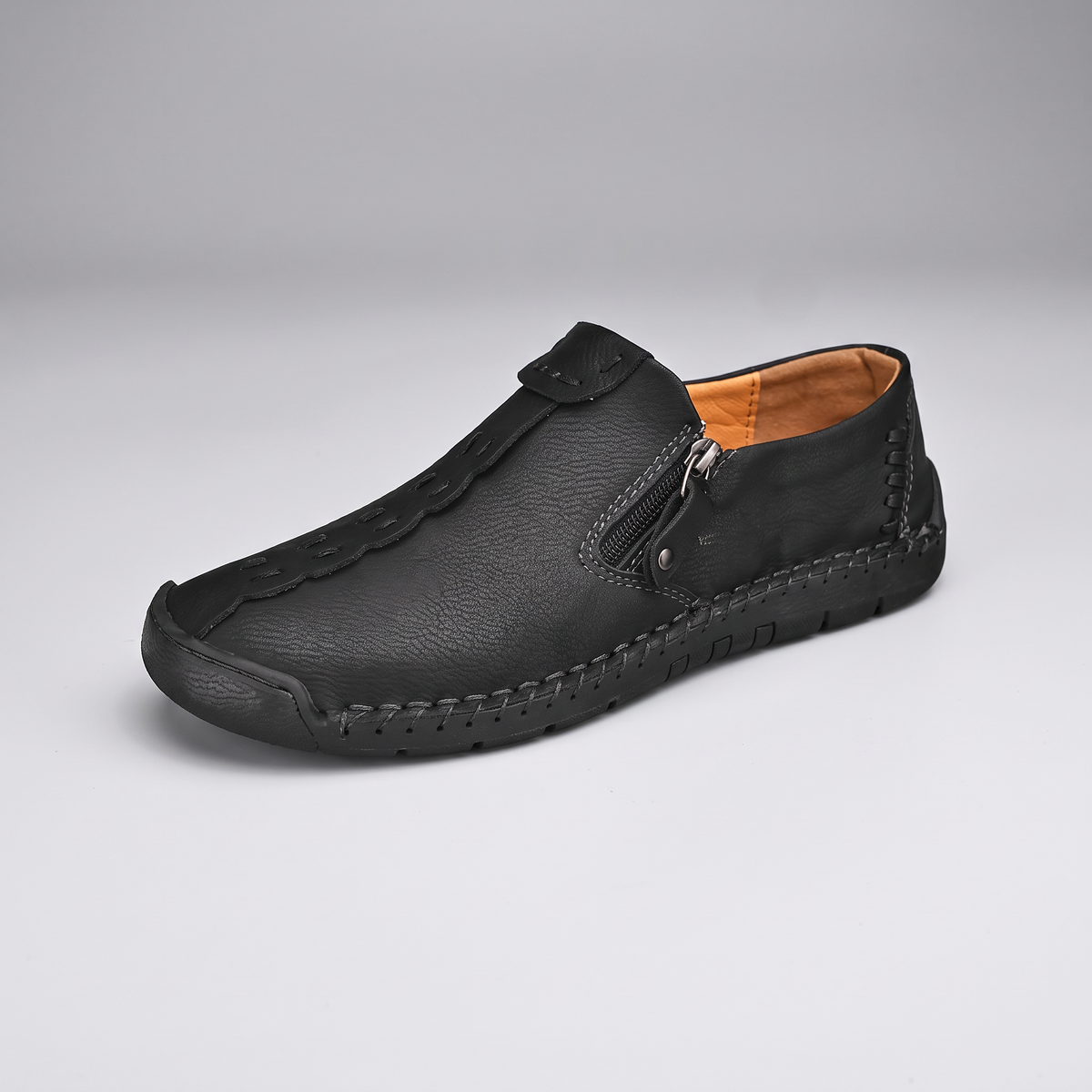 STITCHED LEATHER LOOK SLIP-ONS