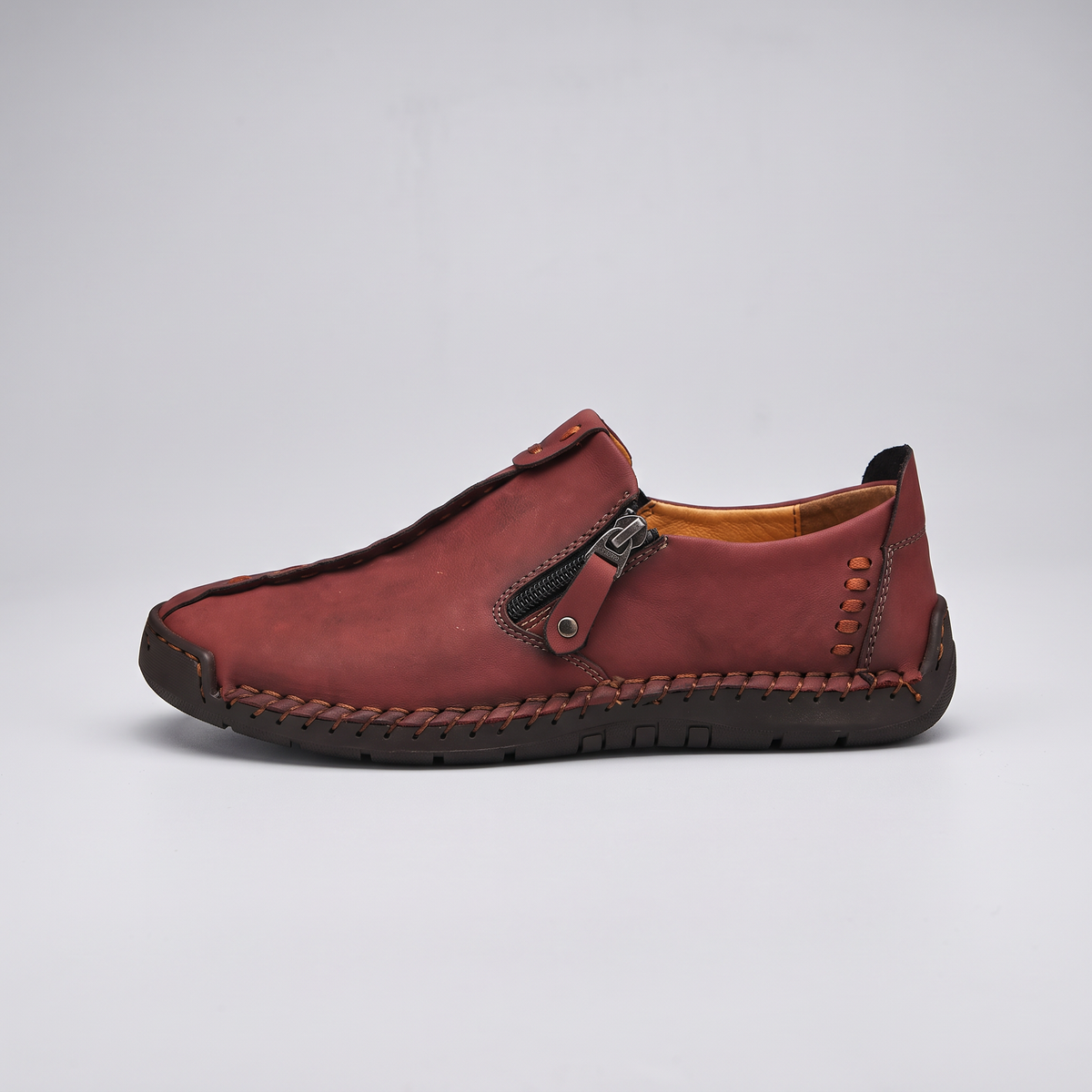 STITCHED LEATHER LOOK SLIP-ONS