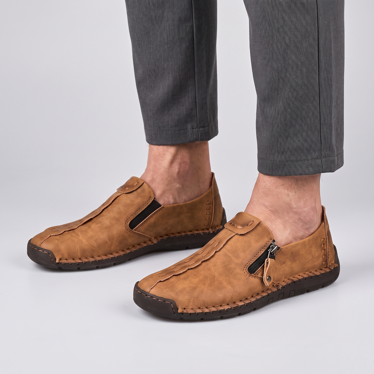 STITCHED LEATHER LOOK SLIP-ONS