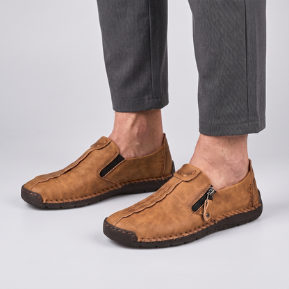 STITCHED LEATHER LOOK SLIP-ONS