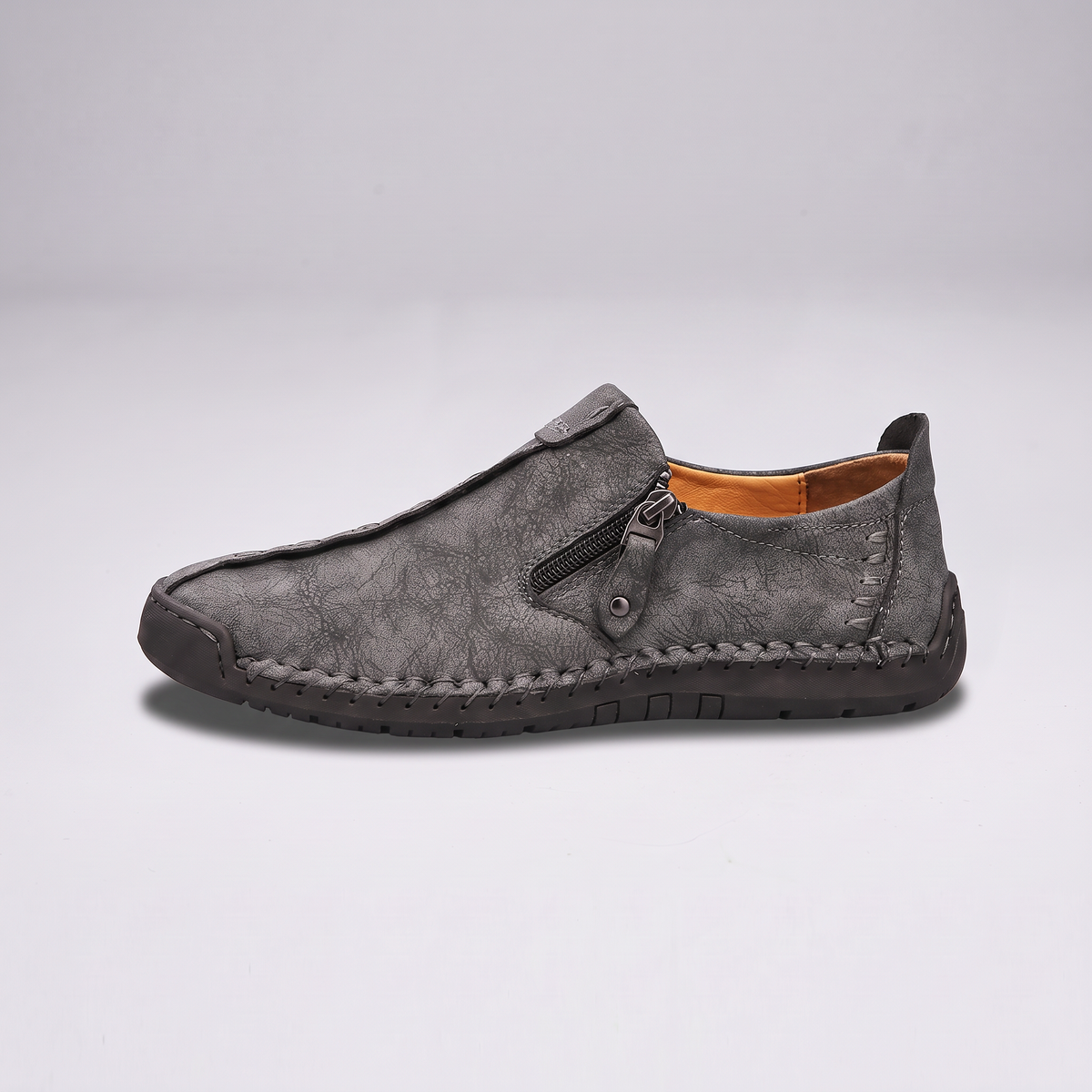 STITCHED LEATHER LOOK SLIP-ONS